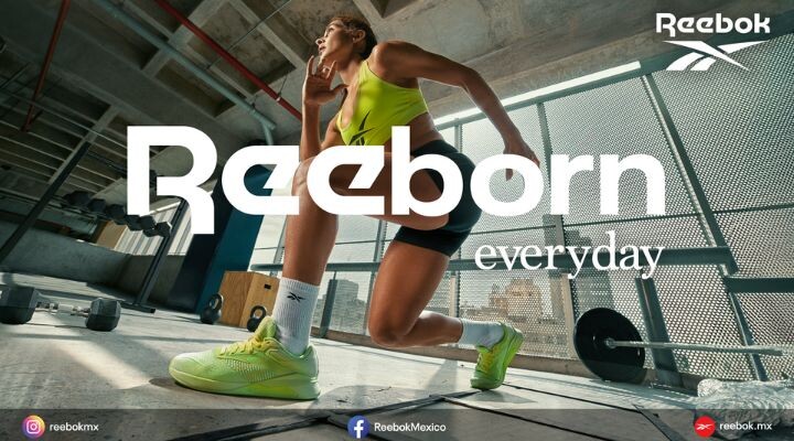 Una persona con un conjunto deportivo verde neón se ejercita con energía en un gimnasio, encarnando el espíritu de "Reeborn everyday". La marca Reebok y el espíritu de la colección Reebok Resurge inspiran energía renovada con cada movimiento.