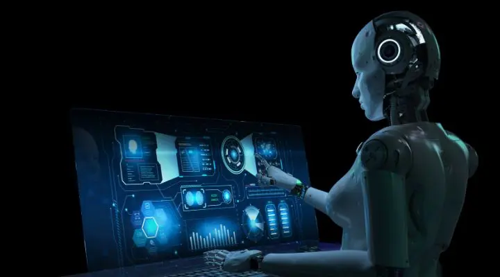 En un entorno poco iluminado, un robot humanoide utiliza agentes de IA para interactuar con una interfaz digital que muestra complejas visualizaciones de datos y gráficos en la pantalla.